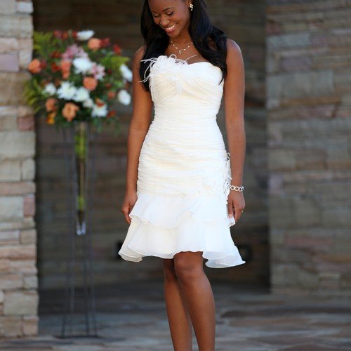Black bride standing laughing