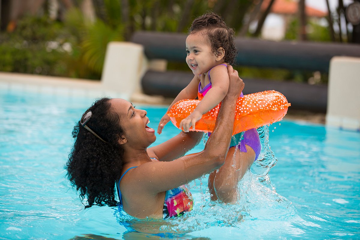 family in pool