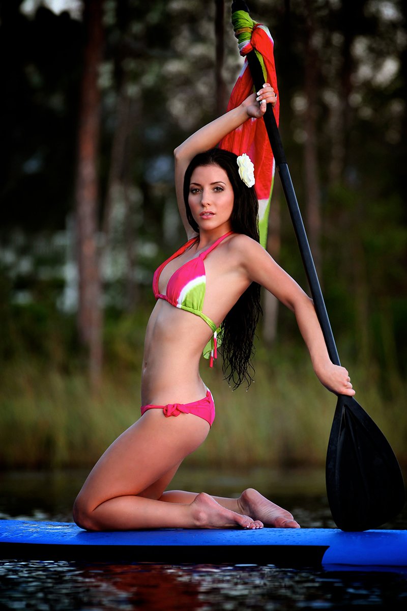 model on paddleboard